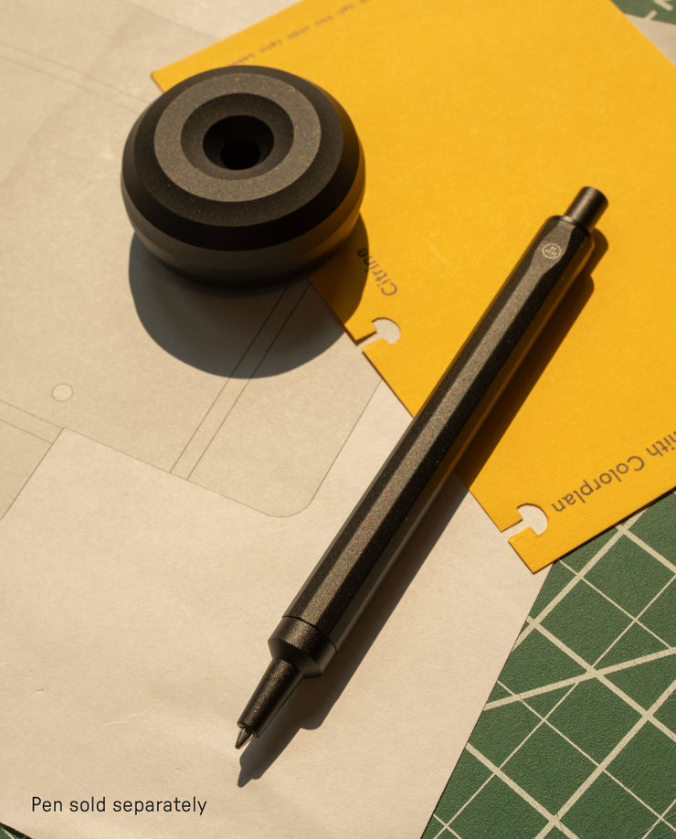 HMM Paperweight Pen Stand (Black)